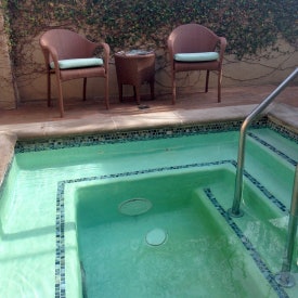 Aquaterra Spa’s outdoor patio Jacuzzi.