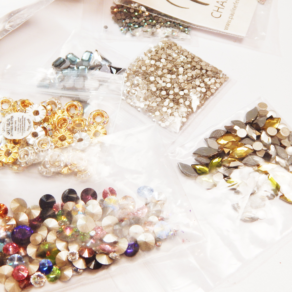 Rhinestones, chains, studs, charms &ndash; you name it! Here are the best way to attach those embellishments to your clients&rsquo; nails.