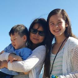 Caitlin with her mother and younger brother