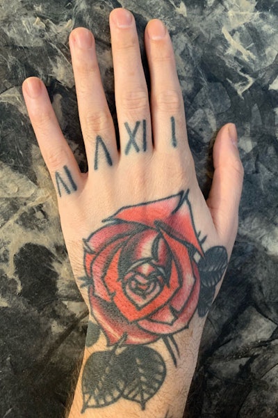 Andrew Fitzsimons Hand Tattoo