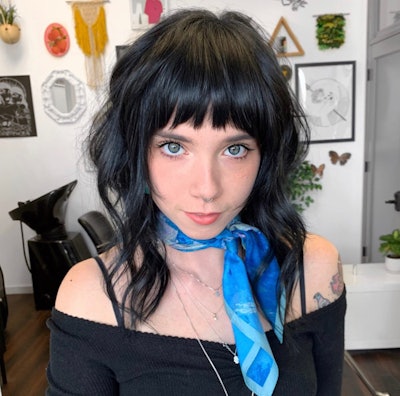 Client with black hair and French fringe