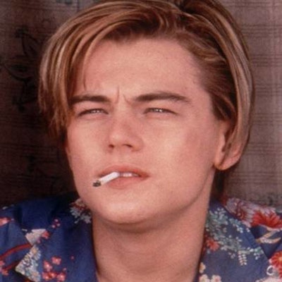 Leonardo DiCaprio wearing a curtained hairstyle.
