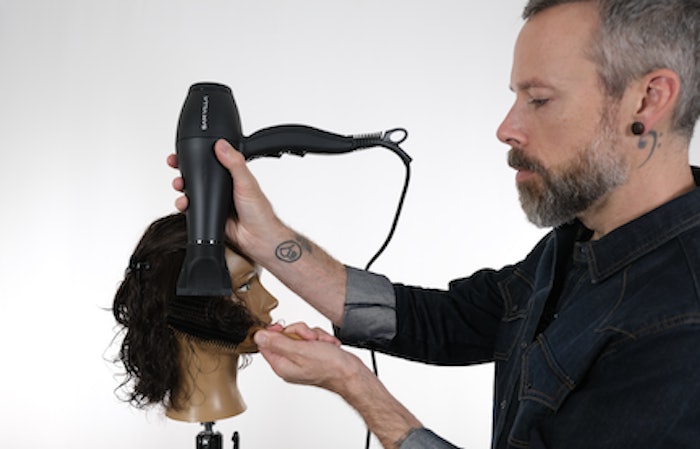 Andrew Carruthers using the Essential Series Blow Dryer