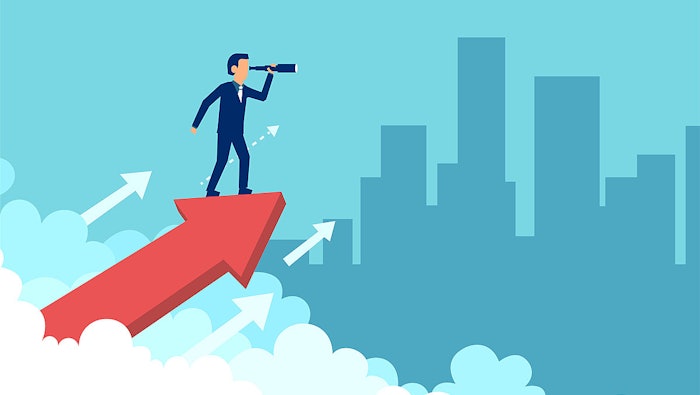 Smart businessman looking forward in spyglass