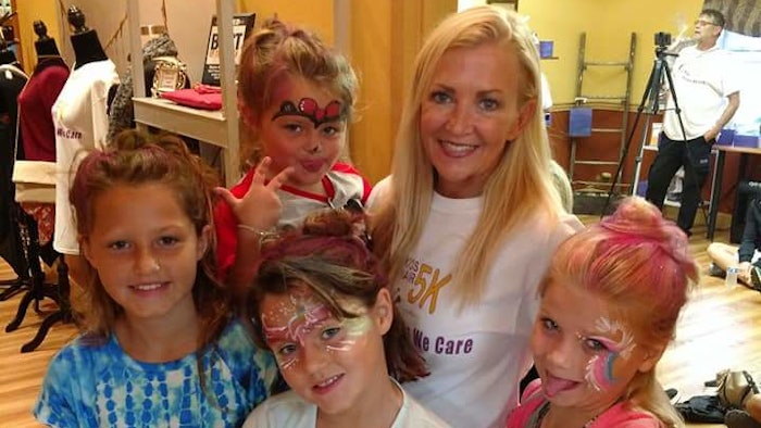 Karen Welch doing charity work