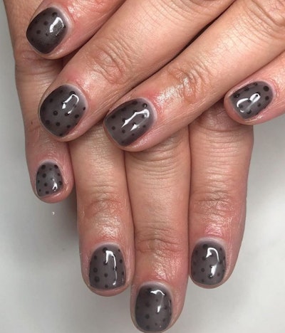 Black polka dot nails by Charlotte Elizabeth