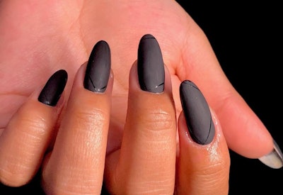 Matte black nails by Angela