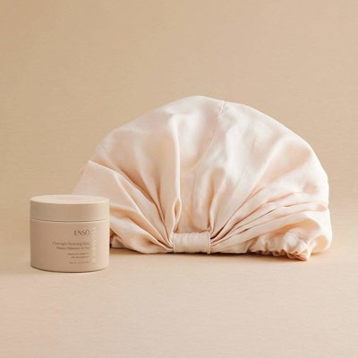 Enzo Overnight Hair Wrap is an organic bamboo cotton hair wrap that protects hair overnight with a friction-free barrier, reducing breakage and thinning for all hair types.