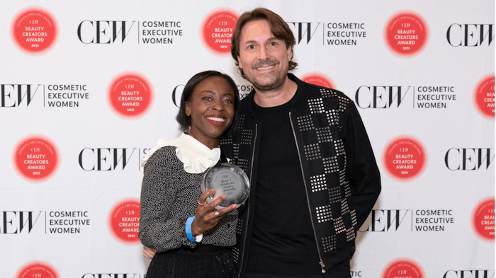 MAC’s SVP of Global Marketing, Aïda Moudachirou-Rébois and Diederik Koenders of MAC accept the Social Superstar award.
