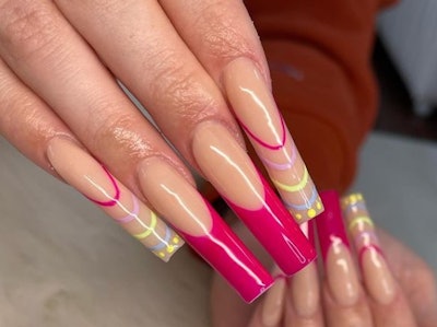 Hand-painted nail design by Zareez Muñiz