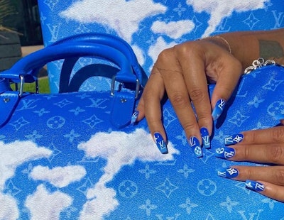 Hand-painted nail design by Neesh