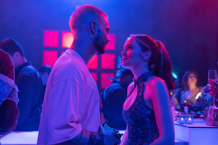 Dylan O'Brien and Zoey Deutch in the film NOT OKAY.