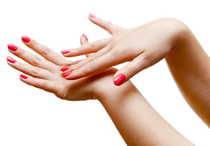Woman showing off her manicure.