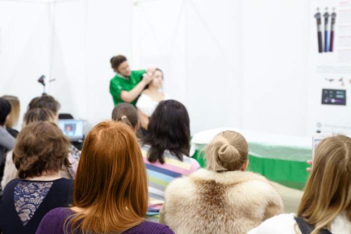 Attendees at a hair presentation