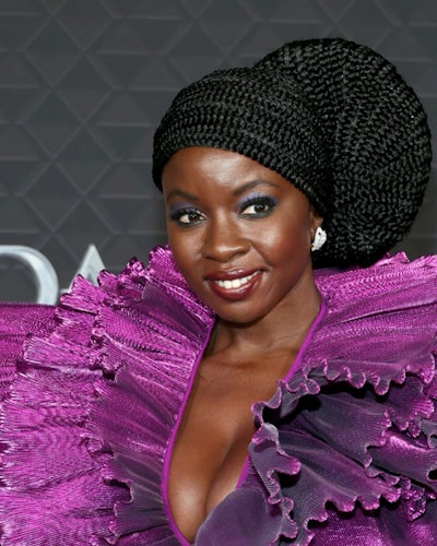 Danai Gurira wears a braided crown to the Wakanda Forever premiere. Her hair was styled by Larry Jarah Sims.