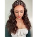 Try out this trending holiday-perfect hair look by Sam Villa ArTeam member Ellen Devine.