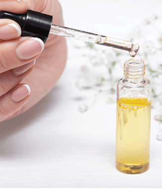 Apply cuticle oil twice a day, keeping the area moisturized. This will avoid dryness of cuticles and breakage that could make product lift earlier.