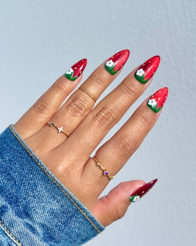 Nail artist Jeanette Flores (@nailartbyjen) shares how she created a strawberry cat eye nail look using products from Daily Charme.