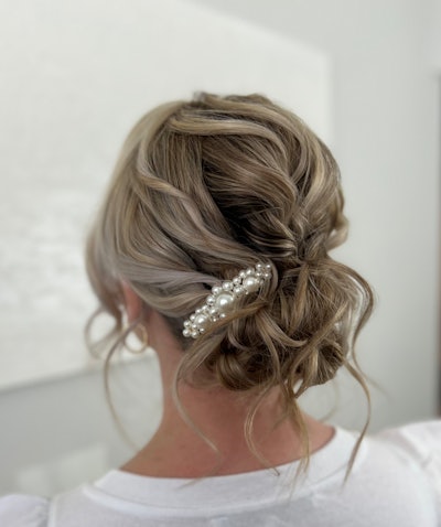 Caralee Pridemore shares how to create a clean texture boho bridal bun that's on trend this spring season.