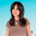 Learn how to create curtain bangs from Orlando-based hairstylist and lover of fringe and textured cuts, Ellie Stommel (@thebangsbabe).