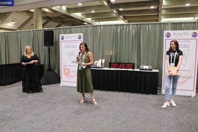 Nailpro Editor-in-Chief Katie Anderson introduces judges Narineh Bedrossian, founder of Ella + Mila, and Sasha Podgorny, founder of Oh My Nails, for the Handpainted Nail Art competition.