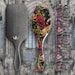 Just in time for fall, Denman has released a new brush line with snakeskin, scorpions and skulls.