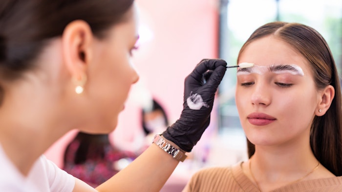 woman working on brows training