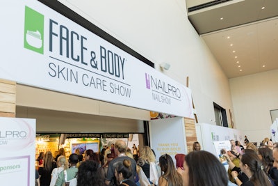 Attendees enter the show floor at the Nailpro Nail Show.
