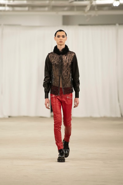 A wet look sported by one of the male model's at the Laurence Basse NYFW runway show.