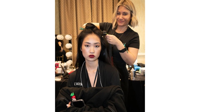IGK Lead Hairstylist Liz Rim used IGK products to create to create a variety of voluminous, tousled, and curly looks for the L'AGENCE F/W 24 Runway Show.
