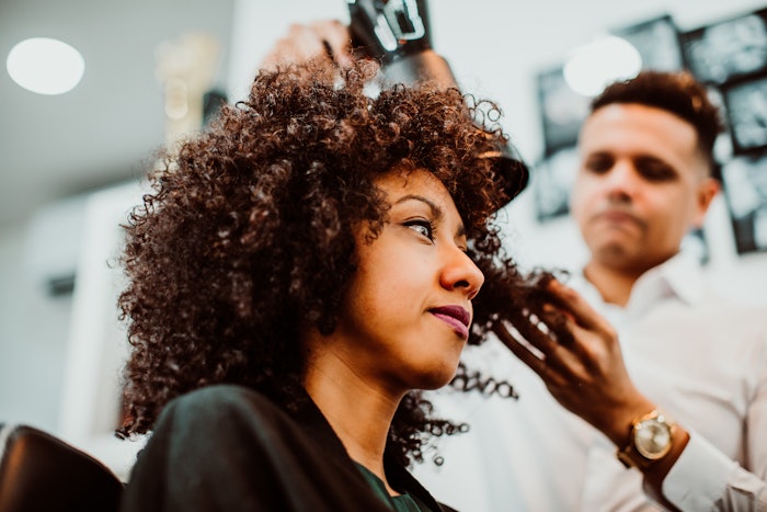 Championed by the Texture Education Collective, Minnesota Governor Tim Walz signed legislation requiring the Cosmetology State Board licensing to include training and testing on all hair types and textures.