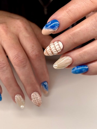 Seashell and beach nail art