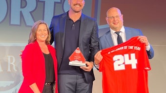 Travis Kelce accepting the Polsinelli Sportsman of the Year award at the Kansas City Sports Awards.