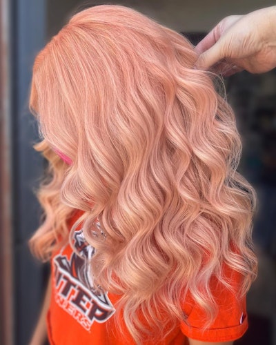 Person with peach colored hair
