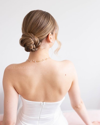 A bride sporting a ballet bun