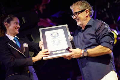 This occasion set the incredible GUINNESS WORLD RECORD for the “Most people styling hair simultaneously,” officially confirmed to be 479 licensed stylists, by the judge and team present at the event.