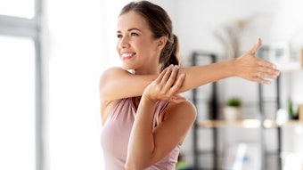 The cross-arm stretch targets your rotator cuff muscles—a group of tendons and muscles around your shoulder joint that hold the bones together.