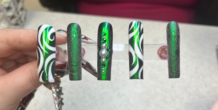 Green chrome nails have spiked in searches due to the 'brat' culture surrounding artist Charli XCX.