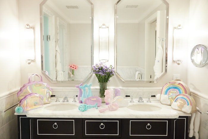 Glimmer Wish products displayed on a bathroom counter.