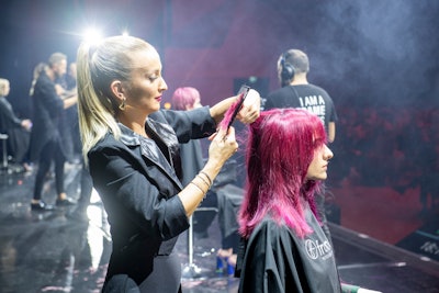 Hairstylist on stage at Framesi International Congress