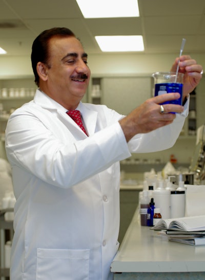 Sam Dhatt in the lab