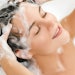 woman in shower washing hair foam and suds
