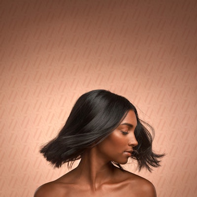 Woman wearing an Arabella Hair wig