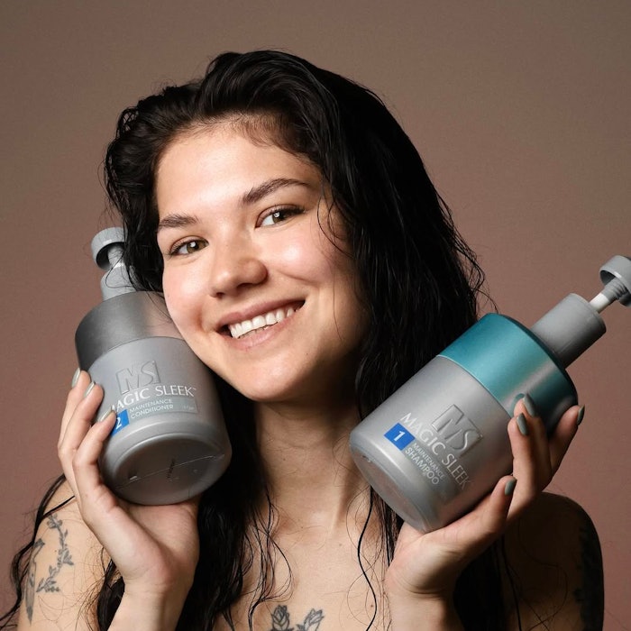 Model posing with Magic Sleek products.