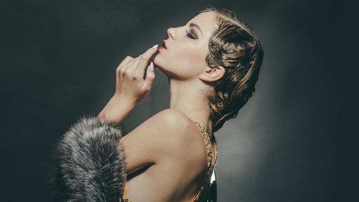 Woman wearing a vintage Hollywood hairstyle.