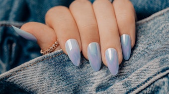 Influencers across TikTok are boasting their blue nails in conjunction with the trend, which is said to reflect they are in a relationship.