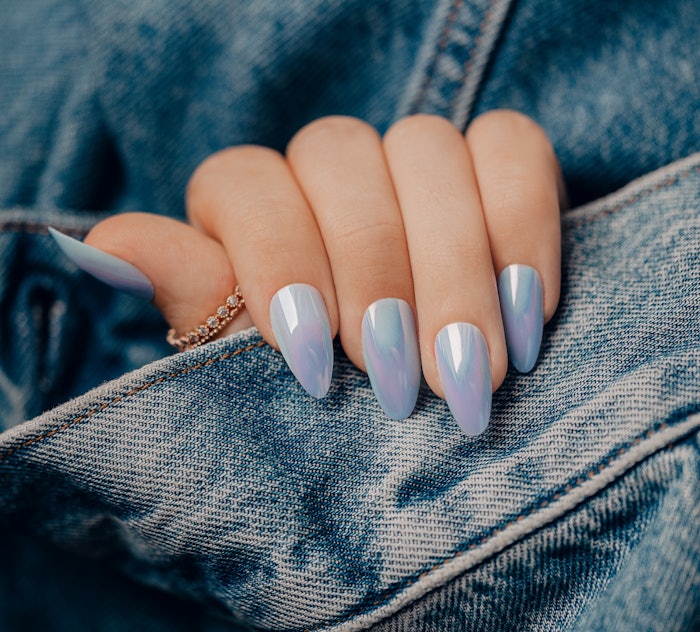 Influencers across TikTok are boasting their blue nails in conjunction with the trend, which is said to reflect they are in a relationship.