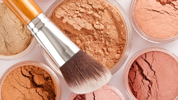 colored makeup powders loose containers with brush