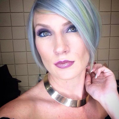 Model with lavender and mint green pastel hair in a bob.