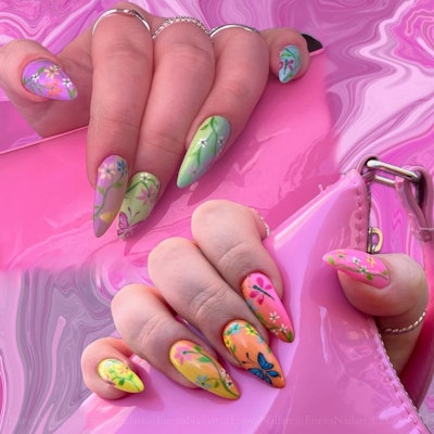 pastel-colored nails with floral, butterfly and dragonfly nail art by @enevanailart